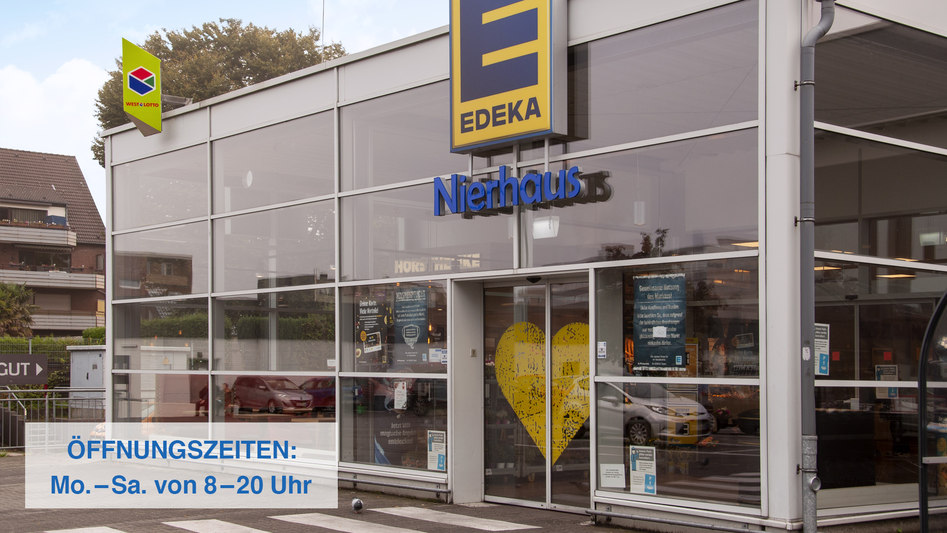 Startseite Header EDEKA Nierhaus Eingang mit Öffnungszeiten unten links