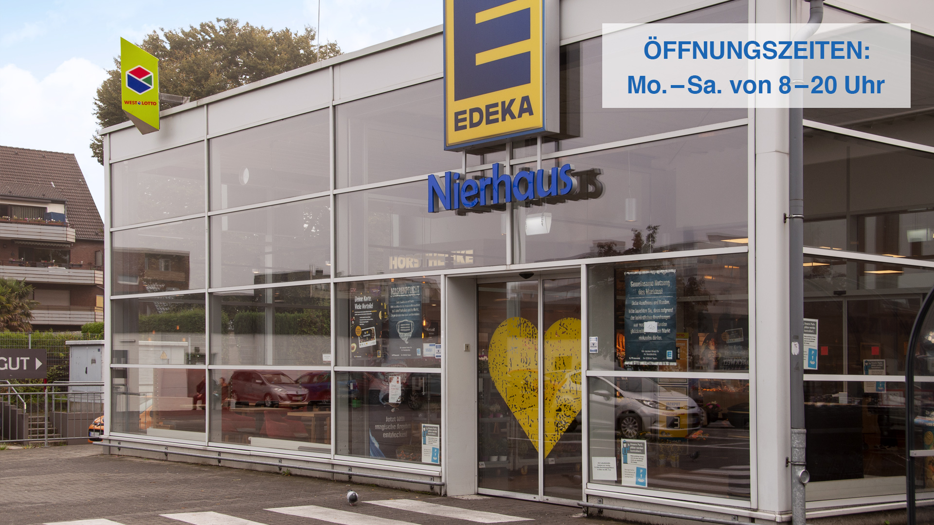 Startseite Header EDEKA Nierhaus Eingang mit Öffnungszeiten oben rechts